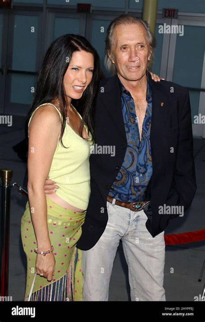 Image of Annie Bierman with her husband David Carradine and with their daughter